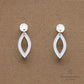 whit and silver earrings