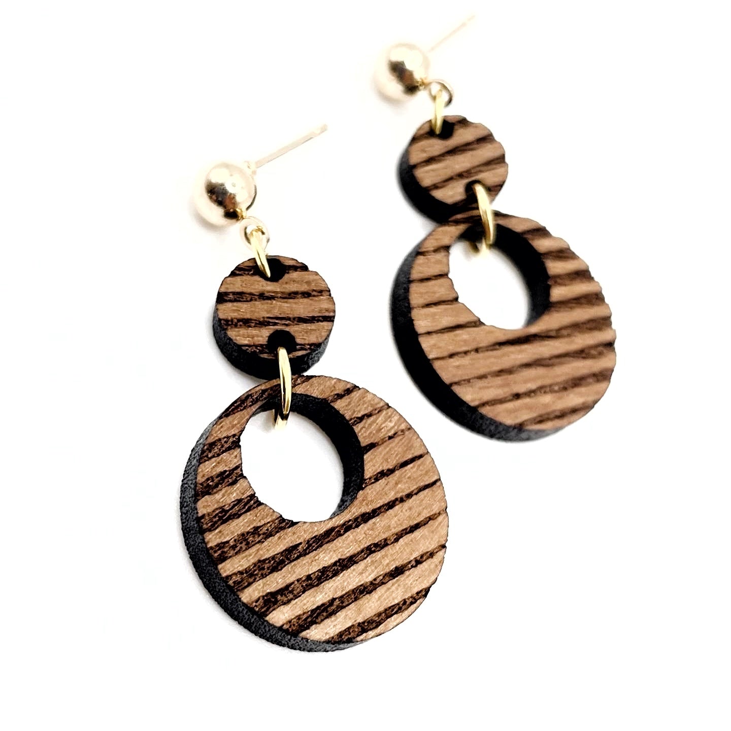 detail of wood engraved earrings